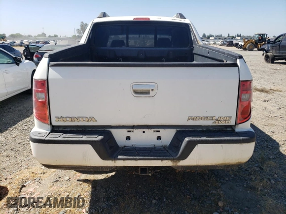2010 Honda Ridgeline RTL with VIN 5FPYK1F56AB004084, listed as a Copart auction lot 58538224 with 97,558 mi miles and Salvage Title. Bid and sale history available at carsss.com. Image 6.