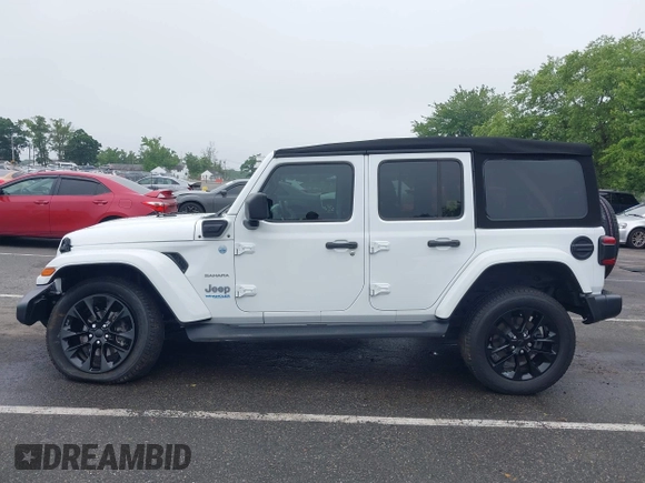 2022 Jeep Wrangler Unlimited Sahara with VIN 1C4JJXP69NW229124, listed as a IAAI auction lot 42525560 with 45,857 mi miles and . Bid and sale history available at DreamBid. Image 14.