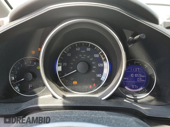 2015 Honda Fit LX with VIN 3HGGK5H59FM709104, listed as a Copart auction lot 63569065 with 101,859 mi miles and Salvage title. Bid and sale history available at DreamBid. Image 9.