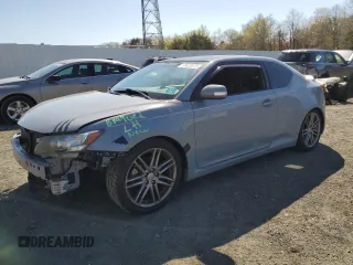 2012 Scion tC z VIN JTKJF5C71C3029365, wystawiony jako Copart lot #53423875 z przebiegiem 121 943 mil mil oraz Szkody całkowita. Historia ofert i sprzedaży dostępna na DreamBid. Obrazek 1.