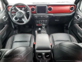 2023 Jeep Wrangler Rubicon with VIN 1C4JJXFM4PW589923, listed as a Copart auction lot 58725465 with 9,814 mi miles and Salvage title. Bid and sale history available at DreamBid. Image 8.