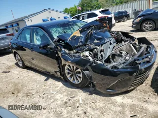 2017 Toyota Camry XLE z VIN 4T1BF1FK0HU700820, wystawiony jako Copart lot #52010655 z przebiegiem Nie podano mil oraz Szkoda całkowita • Salvage title. Historia ofert i sprzedaży dostępna na DreamBid. Obrazek 4.