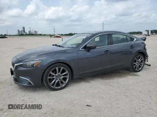2016 Mazda 6 i Grand Touring с VIN JM1GJ1W50G1477892, выставлен на аукционе Copart как лот 55362525 с пробегом 80 806 миль миль и Списание • Salvage title. История ставок и продаж доступна на DreamBid. Изображение 1.