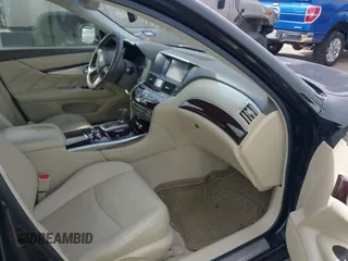 2015 Infiniti Q70 with VIN JN1BY1PP9FM601468, listed as a IAAI auction lot 41745618 with 138,932 mi miles and . Bid and sale history available at DreamBid. Image 5.