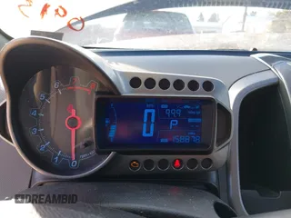 2015 Chevrolet Sonic LTZ z VIN 1G1JE5SB1F4100913, wystawiony jako IAAI lot #41039461 z przebiegiem 158 878 mil mil oraz . Historia ofert i sprzedaży dostępna na DreamBid. Obrazek 7.