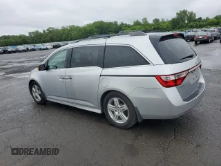 2011 Honda Odyssey Touring with VIN 5FNRL5H99BB021223, listed as a Copart auction lot 61171775 with 194,029 mi miles and Salvage title. Bid and sale history available at DreamBid. Image 2.