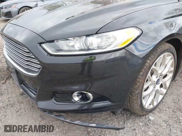 2014 Ford Fusion Titanium with VIN 3FA6P0K92ER355539, listed as a IAAI auction lot 41851471 with 178,176 mi miles and . Bid and sale history available at DreamBid. Image 15.