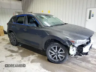 2018 Mazda CX-5 Grand Touring with VIN JM3KFBDM1J0440849, listed as a Copart auction lot 58354655 with 43,348 mi miles and Salvage title. Bid and sale history available at DreamBid. Image 4.