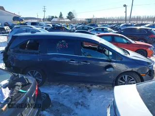 2023 Honda Odyssey Touring with VIN 5FNRL6H80PB005769, listed as a IAAI auction lot 41280858 with 7,041 mi miles and . Bid and sale history available at DreamBid. Image 13.