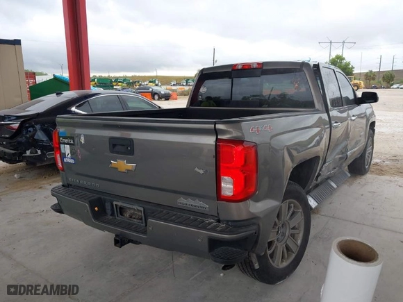 2017 Chevrolet Silverado 1500 High Country with VIN 3GCUKTEC2HG398853, listed as a IAAI auction lot 41969992 with 70,568 mi miles. Bid and sale history available at carsss.com. Image 4.