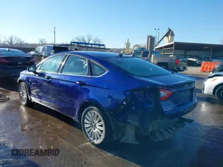 2016 Ford Fusion SE Hybrid with VIN 3FA6P0LU0GR388187, listed as a IAAI auction lot 38604646 with 135,625 mi miles. Bid and sale history available at carsss.com. Image 3.