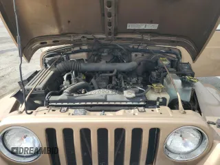 1999 Jeep Wrangler Sahara with VIN 1J4FY49S3XP441051, listed as a Copart auction lot 50946175 with 112,884 mi miles and Salvage Title. Bid and sale history available at carsss.com. Image 12.