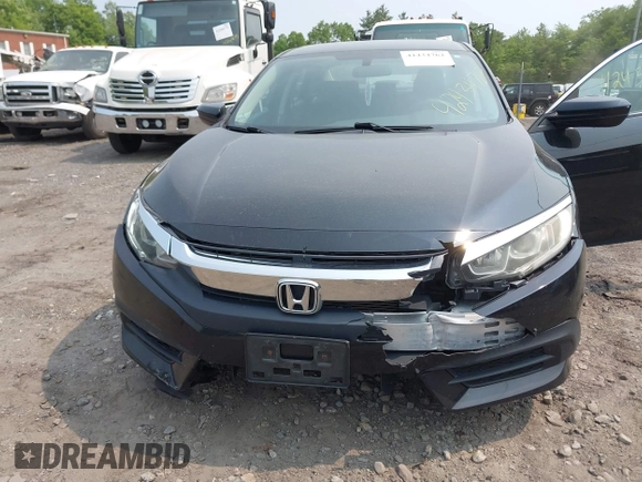 2017 Honda Civic LX z VIN 2HGFC2F50HH539680, wystawiony jako IAAI lot #42434762 z przebiegiem 112 572 mil mil oraz . Historia ofert i sprzedaży dostępna na DreamBid. Obrazek 6.