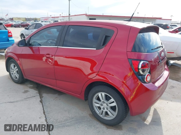 2014 Chevrolet Sonic LT with VIN 1G1JC6SB9E4232389, listed as a IAAI auction lot 41472291 with 165,711 mi miles. Bid and sale history available at carsss.com. Image 3.