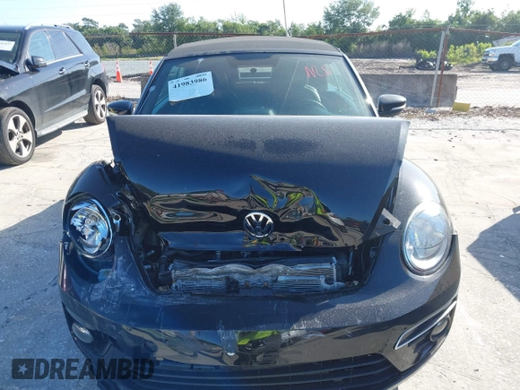 2015 Volkswagen Beetle with VIN 3VW5A7AT7FM811978, listed as a IAAI auction lot 41983986 with 84,421 mi miles and . Bid and sale history available at DreamBid. Image 12.