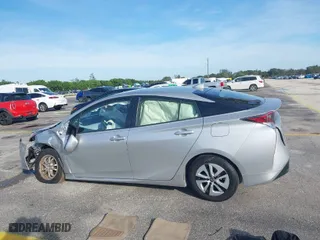 2016 Toyota Prius Four with VIN JTDKARFU1G3009156, listed as a IAAI auction lot 40906451 with 67,449 mi miles. Bid and sale history available at carsss.com. Image 14.