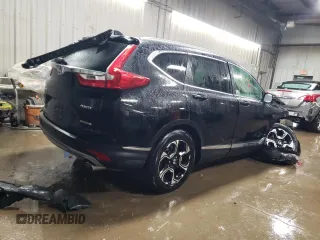 2017 Honda CR-V Touring with VIN 2HKRW2H91HH608340, listed as a Copart auction lot 43997625 with 58,446 mi miles and Salvage Title. Bid and sale history available at DreamBid. Image 3.