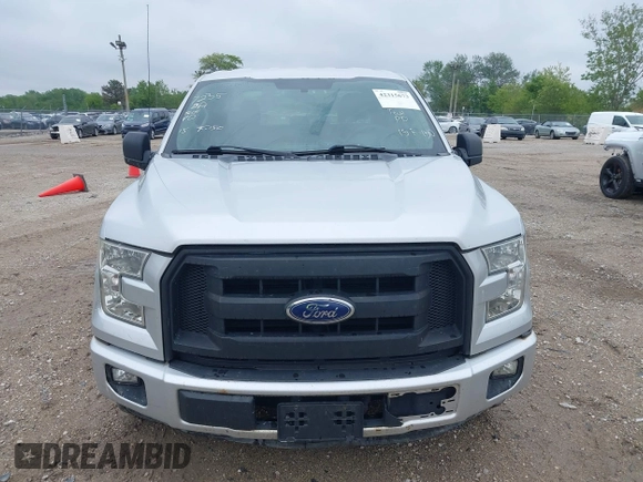 2015 Ford F-150 XL with VIN 1FTEX1C8XFKD19587, listed as a IAAI auction lot 42315673 with 220,319 mi miles and . Bid and sale history available at DreamBid. Image 12.