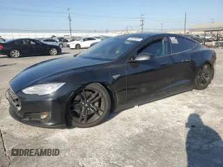 2014 Tesla Model S 60 z VIN 5YJSA1H16EFP40654, wystawiony jako Copart lot #72070974 z przebiegiem Nie podano mil oraz Szkoda całkowita • Salvage title. Historia ofert i sprzedaży dostępna na DreamBid. Obrazek 1.