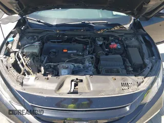 2020 Honda Civic LX with VIN 19XFC2F66LE213975, listed as a IAAI auction lot 42398098 with 69,902 mi miles and . Bid and sale history available at DreamBid. Image 10.