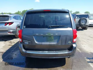 2015 Dodge Grand Caravan SXT with VIN 2C4RDGCG4FR631362, listed as a IAAI auction lot 42027066 with 149,599 mi miles and . Bid and sale history available at DreamBid. Image 16.