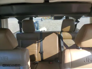 2011 Jeep Wrangler Unlimited Sahara with VIN 1J4BA5H10BL558961, listed as a Copart auction lot 74806494 with 172,855 mi miles and Salvage Title. Bid and sale history available at carsss.com. Image 10.