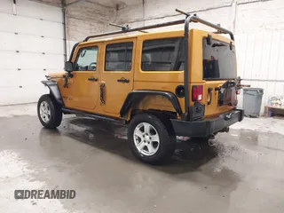 2014 Jeep Wrangler Unlimited Rubicon with VIN 1C4BJWFG7EL254534, listed as a IAAI auction lot 41279731 with 140,218 mi miles. Bid and sale history available at carsss.com. Image 3.