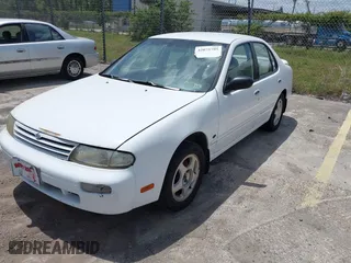 1997 Nissan Altima XE with VIN 1N4BU31DXVC258666, listed as a IAAI auction lot 42075795 with 122,199 mi miles. Bid and sale history available at carsss.com. Image 2.