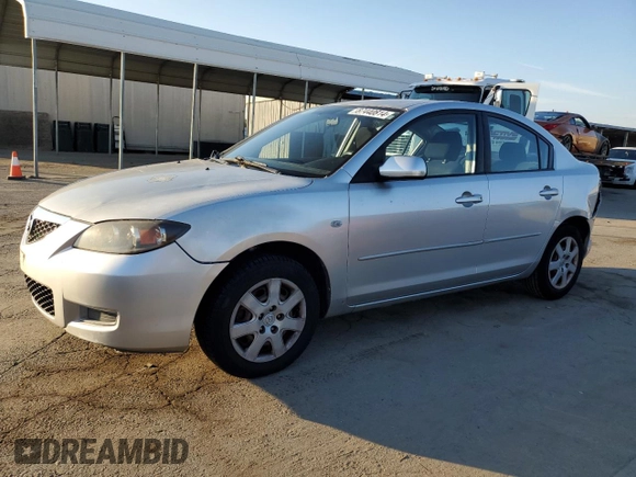 2009 Mazda Mazda3 i Touring Value with VIN JM1BK32G791250048, listed as a Copart auction lot 87440814 with 114,948 mi miles and Salvage Title. Bid and sale history available at carsss.com. Image 1.