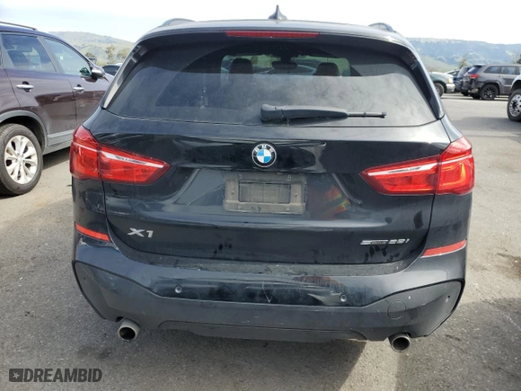 2018 BMW X1 sDrive28i with VIN WBXHU7C3XJ5L06006, listed as a Copart auction lot 47666595 with 56,142 mi miles and Salvage Title. Bid and sale history available at carsss.com. Image 6.