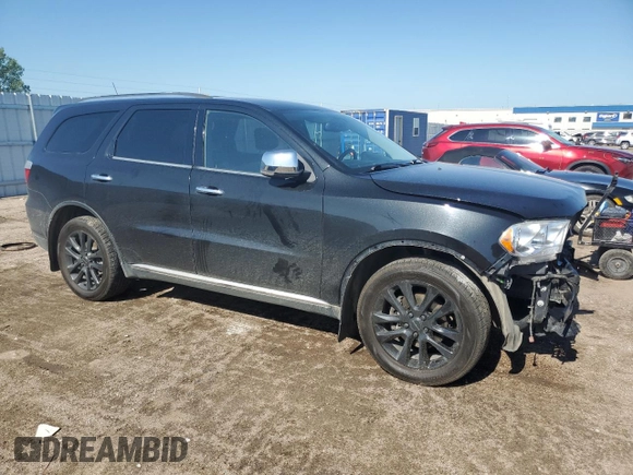2013 Dodge Durango Crew with VIN 1C4RDJDG5DC701016, listed as a Copart auction lot 60832385 with 236,719 mi miles and Salvage title. Bid and sale history available at DreamBid. Image 4.