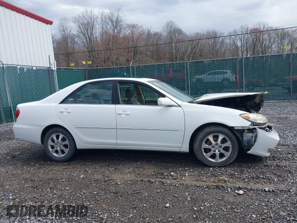 2005 Toyota Camry LE with VIN JTDBF30KX50165586, listed as a IAAI auction lot 41948322 with 84,326 mi miles and . Bid and sale history available at DreamBid. Image 13.