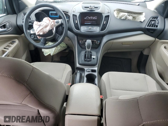 2014 Ford Escape SE z VIN 1FMCU9GX2EUC85787, wystawiony jako Copart lot #52739085 z przebiegiem 123 641 mil mil oraz Szkoda całkowita • Salvage title. Historia ofert i sprzedaży dostępna na DreamBid. Obrazek 8.