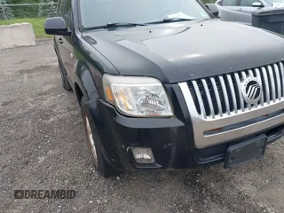 2008 Mercury Mariner Premier z VIN 4M2CU97148KJ47971, wystawiony jako IAAI lot #42355222 z przebiegiem 168 319 mil mil oraz . Historia ofert i sprzedaży dostępna na DreamBid. Obrazek 6.