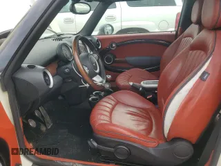 2007 MINI Hardtop S with VIN WMWMF735X7TL83242, listed as a Copart auction lot 41609565 with 83,320 mi miles and Salvage Title. Bid and sale history available at DreamBid. Image 7.