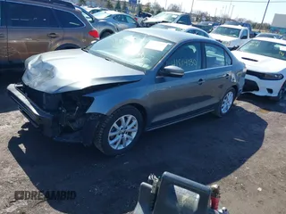 2013 Volkswagen Jetta SE with VIN 3VWDP7AJXDM427960, listed as a IAAI auction lot 41814030 with 105,287 mi miles and . Bid and sale history available at DreamBid. Image 2.