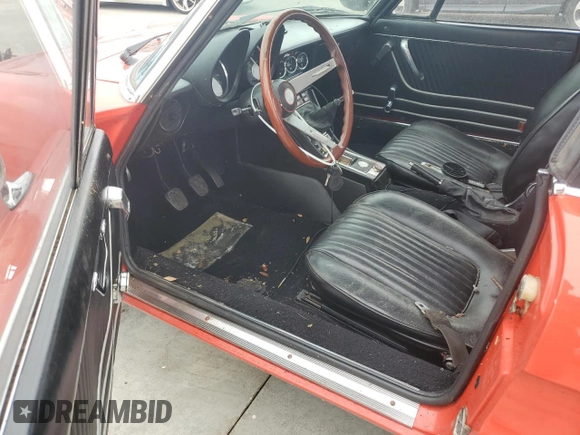1975 Alfa Romeo Spider z VIN AR3047546, wystawiony jako Copart lot #74561034 z przebiegiem 59 884 mil mil oraz Szkoda całkowita • Salvage title. Historia ofert i sprzedaży dostępna na DreamBid. Obrazek 8.
