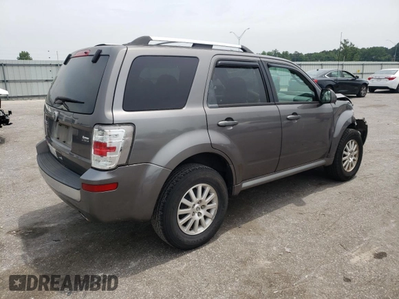 2011 Mercury Mariner Premier z VIN 4M2CN8HG8BKJ07653, wystawiony jako Copart lot #57495725 z przebiegiem 105 624 mil mil oraz Szkoda całkowita • Salvage title. Historia ofert i sprzedaży dostępna na DreamBid. Obrazek 3.
