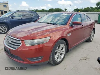 2014 Ford Taurus SEL z VIN 1FAHP2E88EG129181, wystawiony jako Copart lot #62160205 z przebiegiem 191 867 mil mil oraz Czysty tytuł • Clean title. Historia ofert i sprzedaży dostępna na DreamBid. Obrazek 1.
