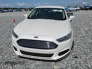 2015 Ford Fusion SE z VIN 1FA6P0H72F5115417, wystawiony jako Copart lot #58768125 z przebiegiem 106 366 mil mil oraz Szkoda całkowita • Salvage title. Historia ofert i sprzedaży dostępna na DreamBid. Obrazek 13.