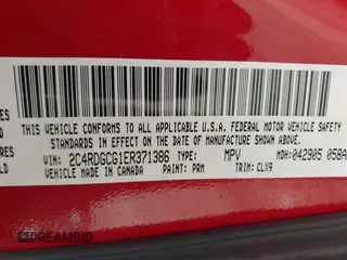 2014 Dodge Grand Caravan SXT with VIN 2C4RDGCG1ER371386, listed as a IAAI auction lot 41822952 with 228,052 mi miles and . Bid and sale history available at DreamBid. Image 9.