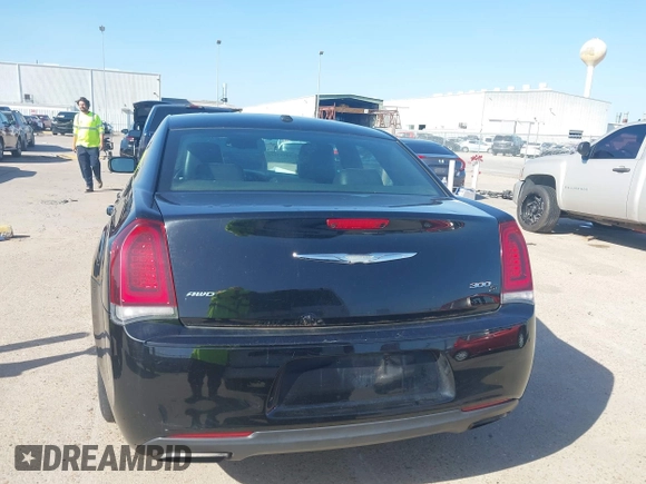 2015 Chrysler 300 with VIN 2C3CCAGG1FH815698, listed as a IAAI auction lot 41853449 with 172,507 mi miles. Bid and sale history available at carsss.com. Image 16.