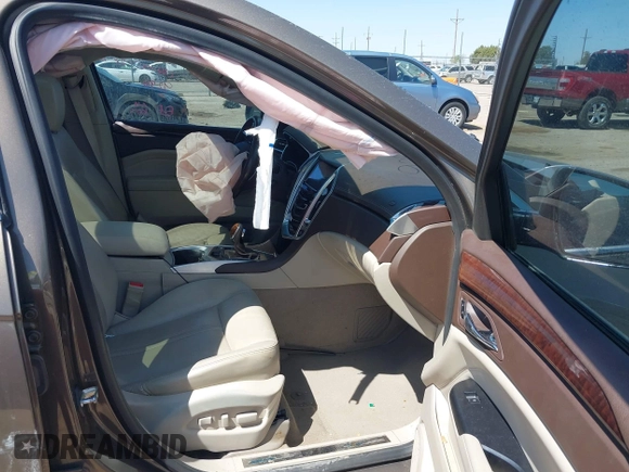 2015 Cadillac SRX Premium Collection with VIN 3GYFNDE32FS569269, listed as a IAAI auction lot 41988807 with 56,481 mi miles. Bid and sale history available at carsss.com. Image 5.