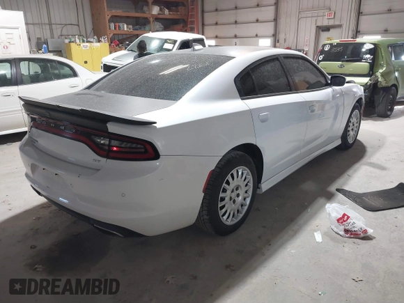 2015 Dodge Charger SXT with VIN 2C3CDXJG9FH785729, listed as a IAAI auction lot 41802261 with 145,974 mi miles. Bid and sale history available at carsss.com. Image 4.