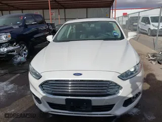 2015 Ford Fusion Titanium Hybrid with VIN 3FA6P0RU9FR308973, listed as a IAAI auction lot 41754320 with 82,686 mi miles. Bid and sale history available at carsss.com. Image 12.