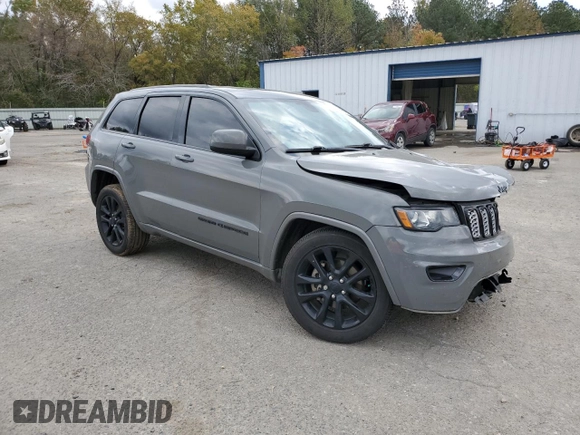 2020 Jeep Grand Cherokee Laredo E with VIN 1C4RJEAG0LC404979, listed as a Copart auction lot 81999474 with 57,328 mi miles and Salvage title. Bid and sale history available at DreamBid. Image 4.