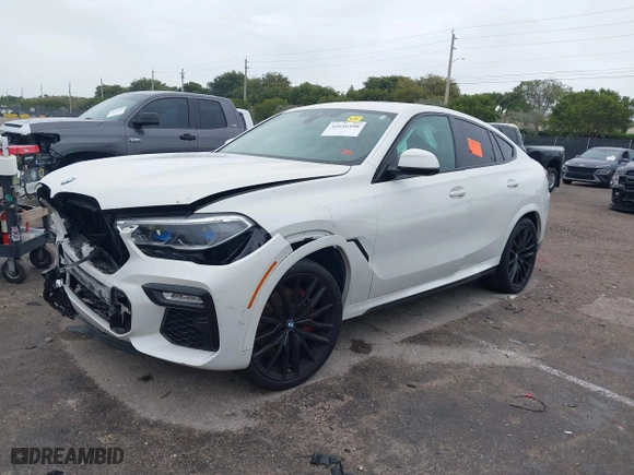 2021 BMW X6 xDrive40i with VIN 5UXCY6C00M9F88215, listed as a IAAI auction lot 41646498 with 43,587 mi miles. Bid and sale history available at carsss.com. Image 17.