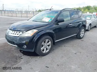 2006 Nissan Murano SL with VIN JN8AZ08T06W411157, listed as a IAAI auction lot 41957424 with 121,902 mi miles. Bid and sale history available at carsss.com. Image 2.