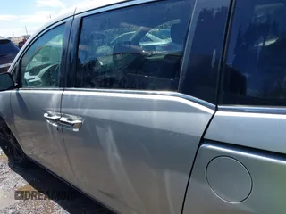 2013 Honda Odyssey EX z VIN 5FNRL5H43DB042964, wystawiony jako IAAI lot #41877997 z przebiegiem 130 282 mil mil oraz . Historia ofert i sprzedaży dostępna na DreamBid. Obrazek 13.