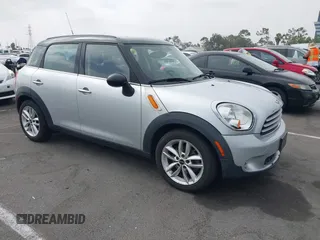 2013 MINI Countryman with VIN WMWZB3C5XDWM09519, listed as a IAAI auction lot 42665715 with 127,891 mi miles and . Bid and sale history available at DreamBid. Image 1.
